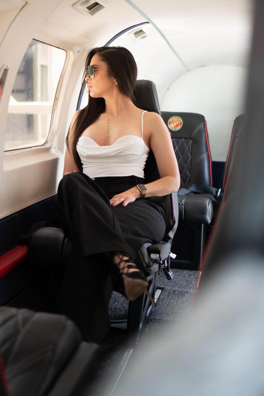 Looking out the window of a private charter flight